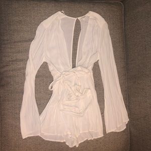 Cotton Candy. Plunging neckline romper